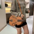 Customized new European and American fashion creative funny personality simulation violin organ guitar pu crossbody bag women's backpack. 