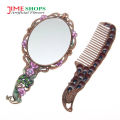 Peacock Design Makeup Mirror & Comb Set.