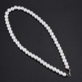 Charm Pearl Necklace w. Metal Clasp.