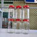 Good quality 400 ml. 04 Pcs Glass Jar for Kitchen & Dining. Glassware Food container with new cap..