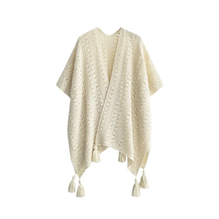 The%20new%20solid%20color%20cut-out%20decoration%20knitted%20ethnic%20shawl%20with%20furball%20cape%20and%20tassel%20in%20summer%20is%20a%20designer%20model%20-%20Image%205