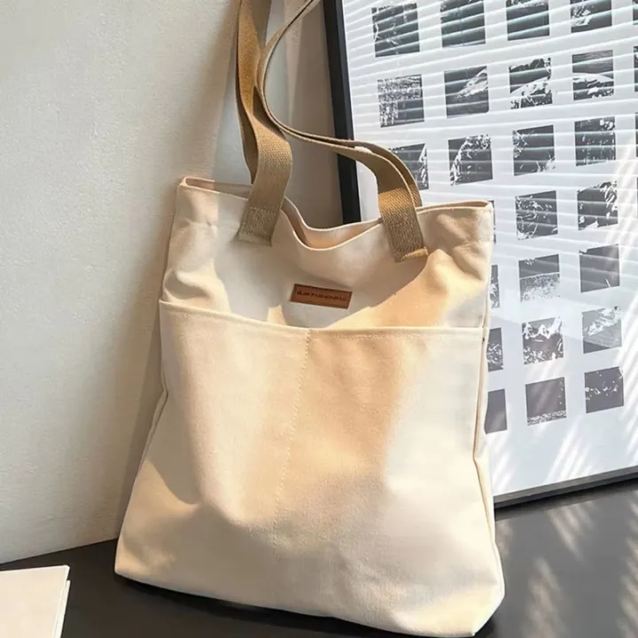 TAG%20Lifestyle%20Canvas%20Tote%20Bag/Fashionable%20Top%20Handle%20Off%20White%20Color%20With%202%20Big%20Outside%20Pocket%20and%20Zipper%20Enclosure%20for%20girls%20For%20University/College/Trendy%20Fashionable%20Women%20-%20Image%2010