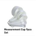 Measerment Cup Set Of 9 piece set  White. 