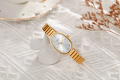 Women Quartz Watch Oval Shaped Fashion Mini Case Small Roman Numeral Dial Female Full Metal Band Watches Niche Wristwatch. 