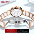 Olevs 5877 White Ceramics Watchstrap Analog Wristwatch for Women. 