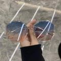 2022 Rimless Sunglasses Women Ocean Water Cut Eyewear Women Men Trimmed Lens Metal Curved Temples Sun Glasses Female UV400.