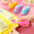 Portable Snack Capper Small Mini Plastic-Envelop Machine Packaging Household Plastic Bag Food Preservation High Temperature Sealing Machine. 