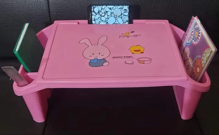 Multi%20functional%20Baby%20Kid's%20Reading%20Table,%20Early%20Education%20Table%20Baby%20Study%20Table%20Plastic%20Toy%20Desk%20Multi-Functional%20Writing%20Desk%20Children%20Bed%20Small%20Desk%20Eating%20Table%20,%20Lovely%20cute%20baby%20reading%20table%20At%20Home%20-%20Image%202