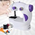 Ming Hui 4 In 1 Mini Sewing Machine With Foot Pedal, Bobbins & Adapter. 
