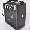 1 Piece 5W Mini Guitar Amplifier Amp Speaker with 3.5mm & 6.35mm Inputs 1/4 Inch Output Black ABS with Volume Tone Adjustment Overdrive.