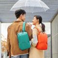 Compact Mi Shoulder Bag - Mini Backpack for Men and Women - Black Sports and Travel Companion.