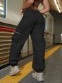 2023 Fashion Hip Hop Street Flap Pocket Solid Zipper Detail Elastic Waist Back Cargo Pants Casual Joggers Trousers.
