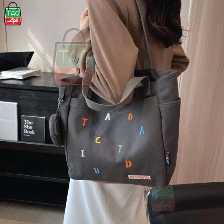 TAG%20Lifestyle%20Exclusive%20Alphabet%20Embroidery%20Design%20Canvas%20Tote%20Bag%20Sand%20Brown%20Color%20Fashionable%20Top%20Handle%20With%204%20Outside%20Pockets%20Trendy%20Fashionable%20Tote%20Bag%20for%20University,%20College%20Students%20Girls%20And%20Women%20With%20Free%20Pouch,%20Pencil%20Bag%20-%20Image%206