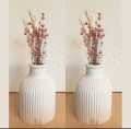 01 Piece Designed flower vase. 