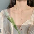 High-end ins bow pearl necklace female gentle fairy niche design exquisite clavicle chain temperament neck necklace. 