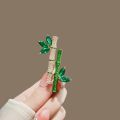 Temperament Elegant Retro Green Plant Imitation Emerald Bamboo Shape Brooch Pin For Women Brooches Suit Collar Dress Accessories.