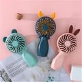 Handheld Fan Cartoon Summer Desktop Student Mini Electric Fan USB Charging Portable Mini Astro Fan.