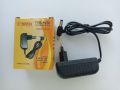 Universal Automatic 1.5V to 12V Power Adapter Charger With 2 Jack. 