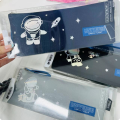 Morning light flies to the universe inverted trapezoid pencil case male astronaut stationery bag cartoon large capacity dirty stationery pencil case. 