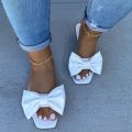 Cross-border 2020 new European and American summer square toe flat bottom straight bow solid color bow women's sandals in stock.