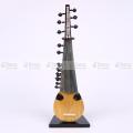 Sarod wooden miniature musical instrument showpiece.