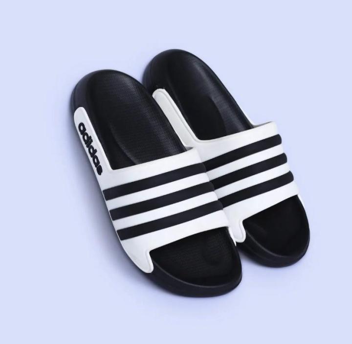 Men%E2%80%99s%20Adidas-PUMA%20Style%20Black%20&%20White%20Slide%20Slippers%20%E2%80%93%20Lightweight,%20CoMen%E2%80%99s%20Black%20&%20White%20Striped%20Casual%20Slides%20%E2%80%93%20-%20Image%202