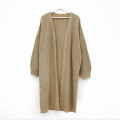 Korean version lazy wind pit strip long sweater women's coat 2023 new solid color loose balloon sleeve knitted cardigan tide. 