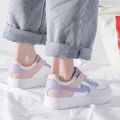 Women's Purple Sneakers. 