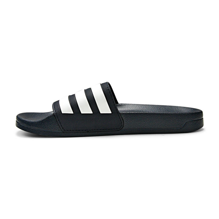 ADIDAS%20ADILETTE%20SHOWER%20LEGINK/%20FTWWHT/LEGINK%20INTERNATIONAL%20SPORTS%20MENS%20SLIDE%20-%20Image%203