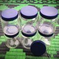 Good quality 400 ml. 04 Pcs Glass Jar for Kitchen & Dining. Glassware Food container with new cap..