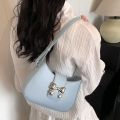 This year's popular bow handbag bag women's 2024 spring and summer new fashion foreign shoulder armpit small square bag. 