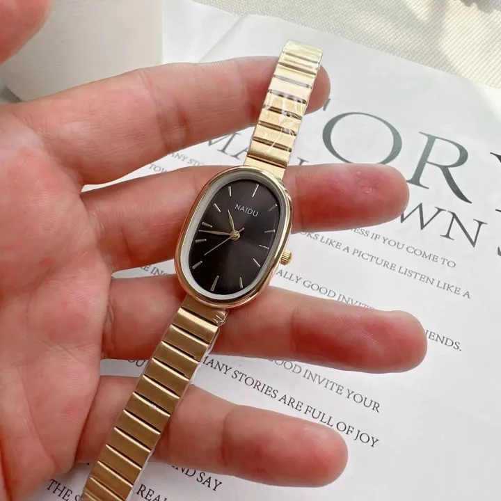Women%20Quartz%20Watch%20Luxury%20Oval%20Shaped%20Fashion%20Mini%20Case%20Small%20Roman%20Numeral%20Dial%20Female%20Full%20Metal%20Band%20Watches%20Niche%20Wristwatch%20-%20Image%205