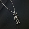 kaws sesame street doll necklace european and american ins trendy brand hip hop personality men's bundy couple pendant sweater chain. 