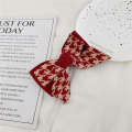 Simple polka dot checkered bow spring clip sweet versatile New Year red accessory Japanese and Korean hair clip at back of the head.