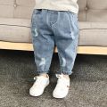 Children's Ripped Jeans Spring and Autumn New 1-8 Girls and Boys Years Old Loose Trousers Baby Western Style Daddy Pants. 