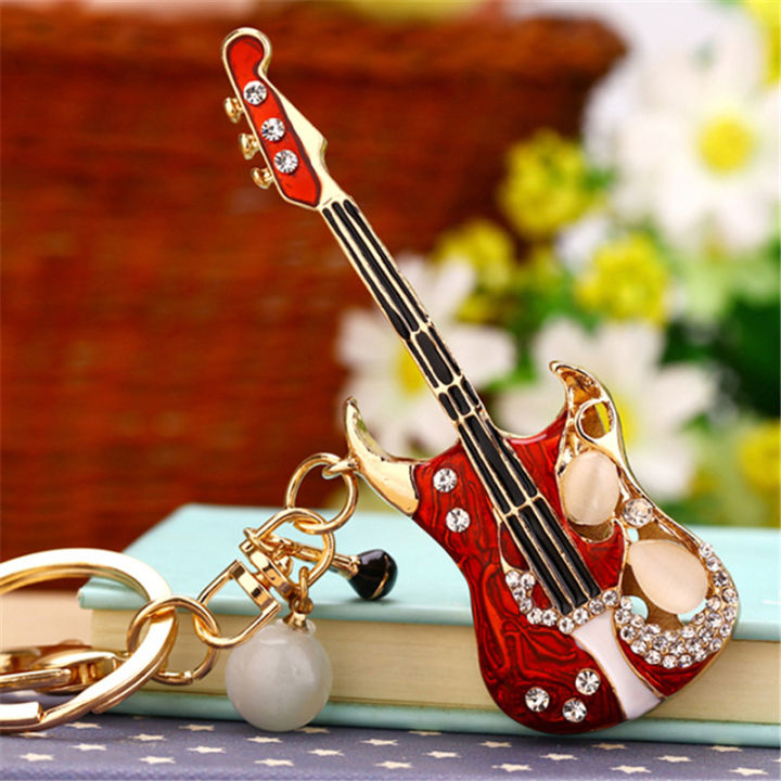 rhinestone small guitar car keychain female Korean version creative bag pendant metal key chain ring foreign trade gifts wholesale