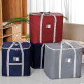 Manufacturers wholesale moving packing bags thickened double quilt storage bags oxford cloth large duffle bags large capacity. 