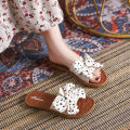 Sandals women's 2021 summer wear bow bow versatile non-slip flat sole wettable word Internet celebrity beach shoes women. 