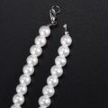 Charm Pearl Necklace w. Metal Clasp.