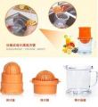 Enjoy Freshly Squeezed Juice With Hand Press Juicer With Fruit Squeezer Cup - Convenient And Colorful Juicing Tool.