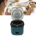 Mini Rice Cooker Small Travel Rice Cooker 1.2L Capacity with Handle for 1 to 3 People . 