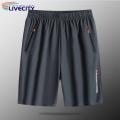 Short Pants Elastic Waistband Men Ice Silk Fitness Loose Shorts.