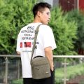 New Casual Men's Canvas Shoulder Bag Men Messenger Bags Simple Lightweight Small Travel Bag Crossbody Bag.