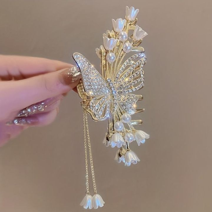Large%20Butterfly%20Hair%20Claw%20Clips%20Gold%20Flower%20Lily%20of%20The%20Valley%20Violet%20Hair%20Claw%20Clips%20with%20Tassel%20Metal%20Pearl%20Nonslip%20Clamps%20Hair%20Styling%20Accessories%20for%20Thick%20Long%20Hair%20Women%20-%20Image%2010