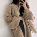 Korean version lazy wind pit strip long sweater women's coat 2023 new solid color loose balloon sleeve knitted cardigan tide. 