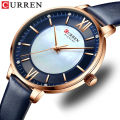 CURREN C9080L Navy Blue PU Leather Analog Watch For Women - RoseGold & Navy Blue. 