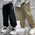 2023 Autumn and Winter Boys' New Fashion Solid Color Thickened Loose Versatile Sports Pants Casual Comfort Versatile Pants. 