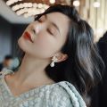 Korean version of fashion hot selling earrings simple temperament crystal butterfly pearl ear nail Earrings women. 