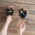 Soft sole non-slip wear sweet girl sandals 2024 new summer bow flat fashion and versatile beach shoes. 