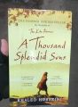A Thousand Splendid Suns by Khaled Hosseini (Paperback). 